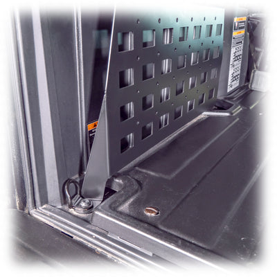 Installed cargo molle panels on an adventure UTV