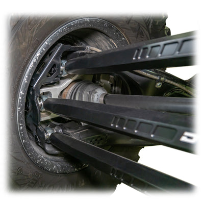 Installed barrel radius rod kit under rear control arm of Maverick X3 Wheel Close up