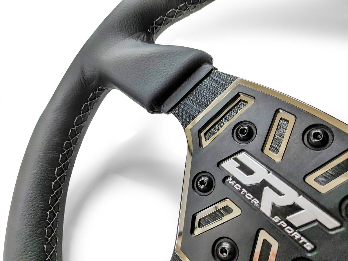 Details of a Round utv steering wheel in leather finish